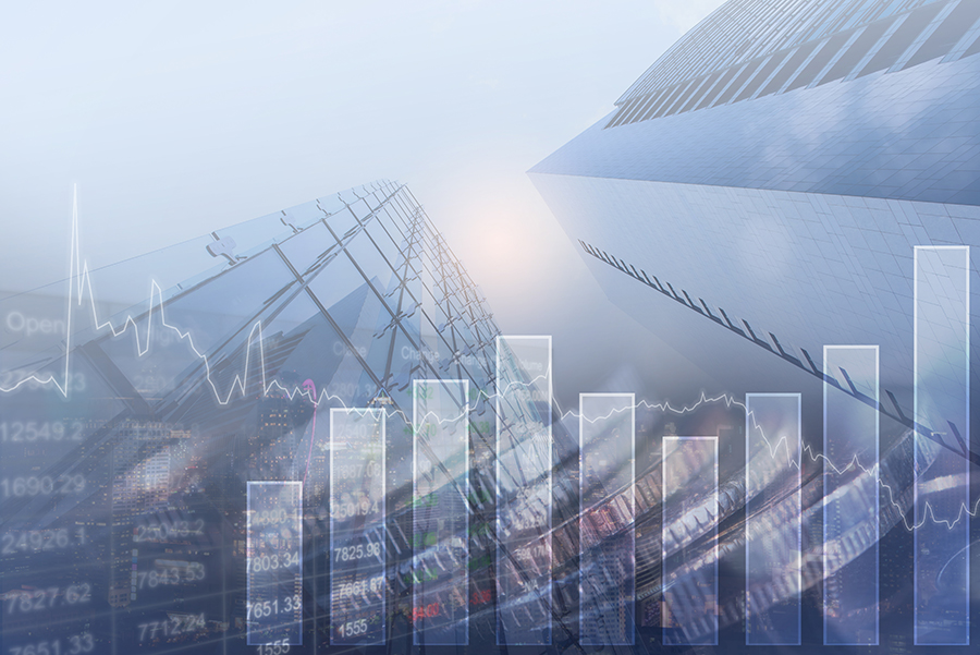Embedded-Analytics-for-Real-Estate-Management-Software-Suite-banner Highrise buildings with data bars and metrics digitally placed in front